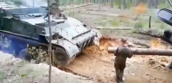KrudPlug Mobile - Solider gets crushed by a tank during a training exercise in Russia! 