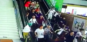 KrudPlug Mobile - Ceiling collapses while people go down the escalator!  