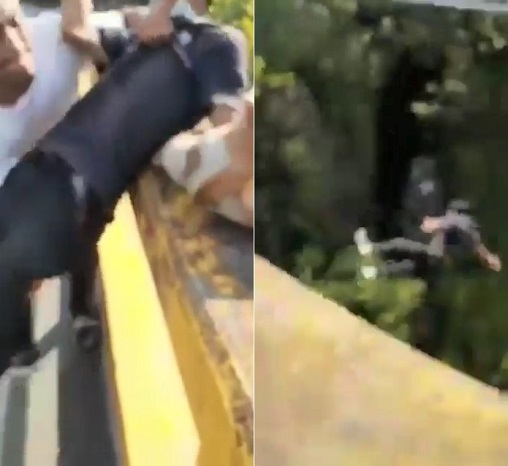 KrudPlug Mobile - Shocking video of thug throwing Peruvian young man off bridge, read 